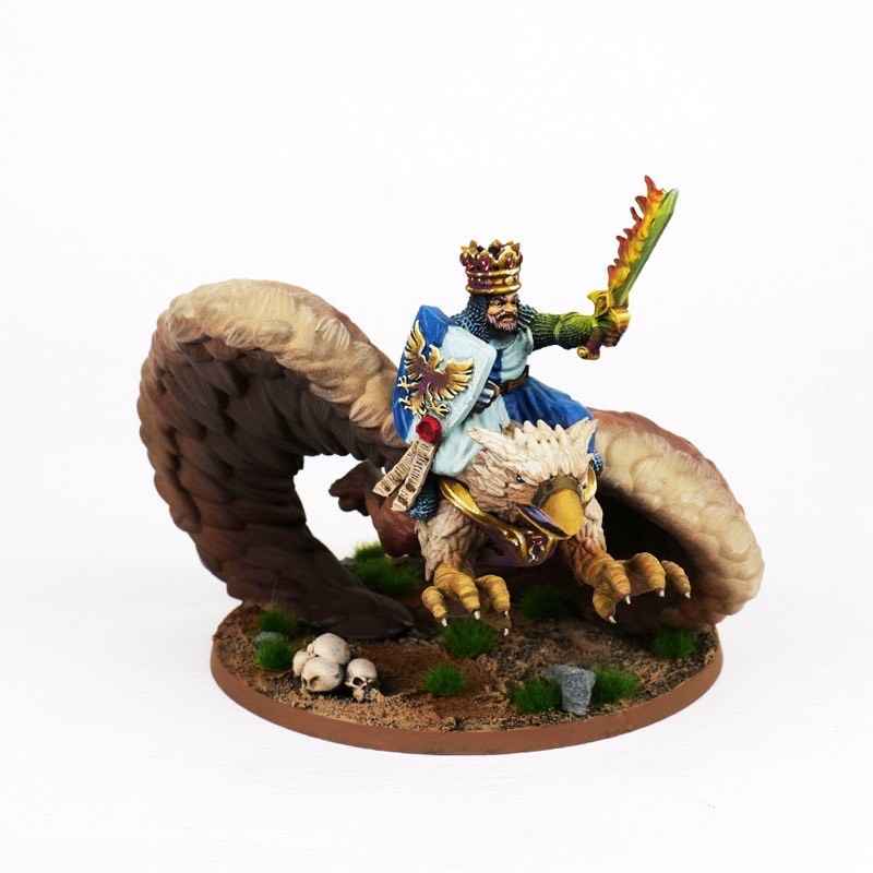 Painted king riding a gryphon miniature